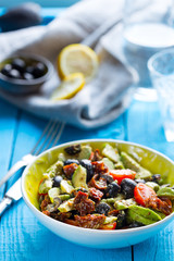 Healthy Paleo Salad with Avocado and Sun-Dried Tomatoes, Vertical View