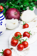 Cherry tomatoes in a barrel, selective focus, front view, vertical