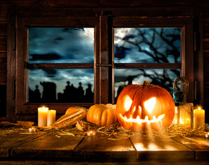 Scary halloween pumpkin on wooden planks