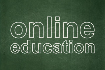 Obraz premium Studying concept: Online Education on chalkboard background