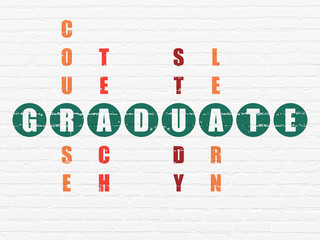Education concept: Graduate in Crossword Puzzle