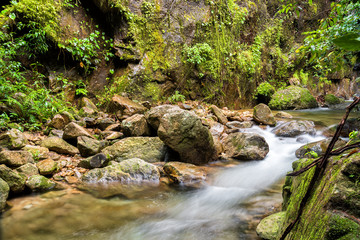 Beautiful waterfall from mountain in rain forest. Umpang, Thailand