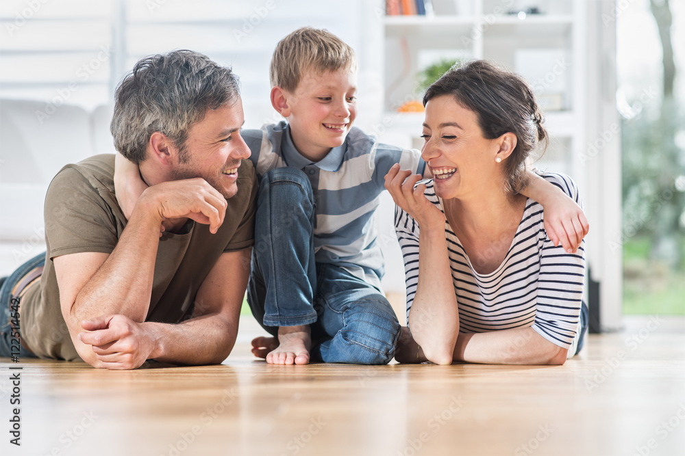 Sticker At home, a cheerful are lying on the wooden floor