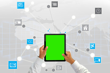 Businessman working with tablet green screen.Social media backgr
