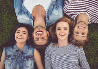 Friends resting in park
