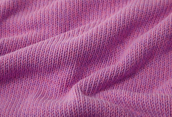 A full page of bright pink knitwear background texture