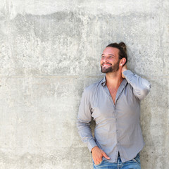 Obraz premium Handsome modern man with beard smiling