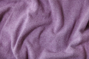 Fototapeta na wymiar A full page of purple fine knit background texture