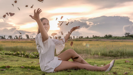 Cute girl in holiday . A cute asian girl on the park in holiday. That showing a girl in relaxing moment.