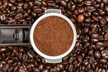 Filter holder for espresso coffee machineon coffee beans backgro