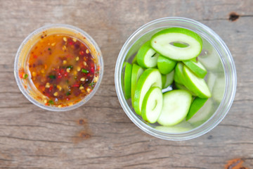 Fresh sweet and sour green sliced mango with chili paste for tro