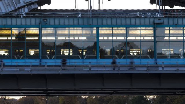 arriving and departure of metro train on station locate on  overpass time lapse
