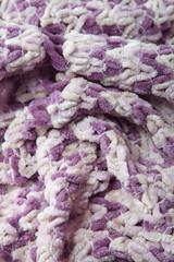 A full page of pink and white knit background texture