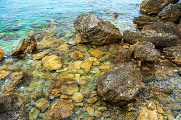 Fototapeta na wymiar Beautiful seascape. Sea surface, rocks on the shore