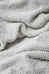 A full page of soft white toweling fabric texture