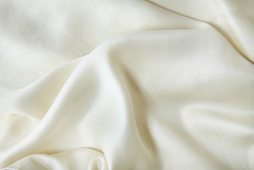 A whole page of soft cream silk material background texture