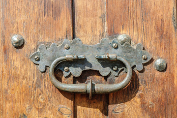 medieval iron door knocker in a door in the Albarracin town in the province of Teruel, Aragon, Spain