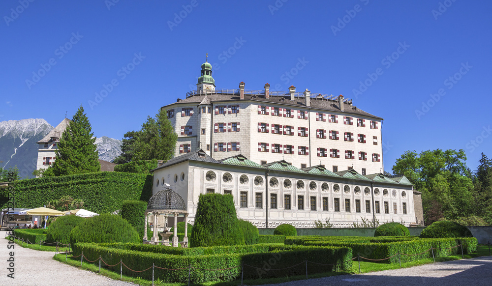 Wall mural Ambras Castle and the green garden in Innsbruck ,capital of Tirol, Austria