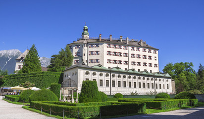 Fototapeta na wymiar Ambras Castle and the green garden in Innsbruck ,capital of Tirol, Austria