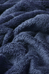 A full page of navy blue bath robe background texture