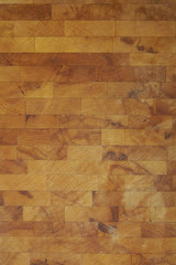 A full crop of olive wood chopping board background texture