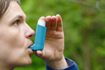 Asthma patient inhaling medication