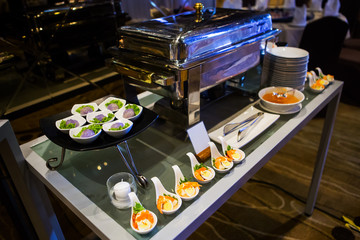 Close-up view of dessert buffet with delicious sweet bakery and