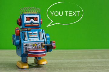 Old robot toy with text frame.