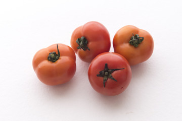 A plurality of tomatoes
