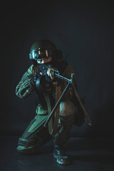 The man in the image of a member of the special forces division with a machine gun. Russian police special force - Special Rapid Response Unit or SOBR (Spetsnaz).