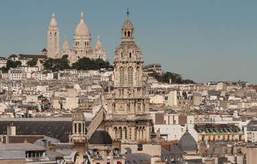 Fototapeta na wymiar The Saint Trinity church and Sacre Coeur basilica , Paris, Franc
