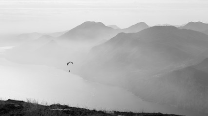 Paraglider in action, bw