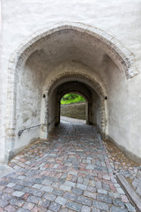 Ancient arch pathway, Tallinn old town in Estonia