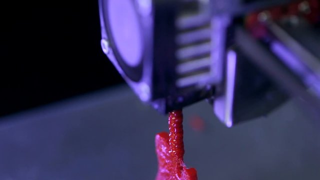 Close up. 3D printer making part of human prosthesis. HD.
