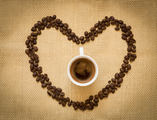 Fresh black coffee and beans