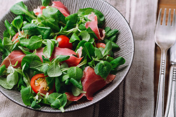 Close-up of salad with meat on plate