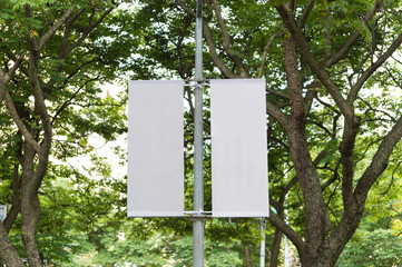 Large blank billboard on a street wall, banners with room to add your own text