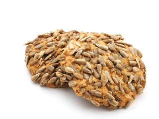 Obraz premium Tasty cookies with sesame and sunflower seeds isolated on white background