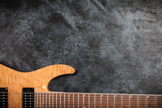 Electric guitar on grey background