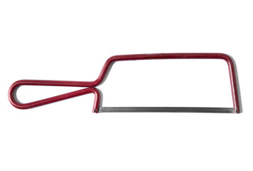 A small red hack saw isolated on a white background