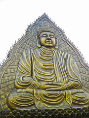 Fototapeta premium Buddha statue on a sky background