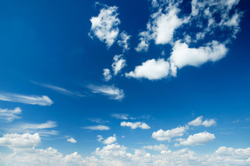 white fluffy clouds in the blue sky