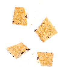 Broken into pieces cookie isolated over the white background