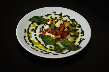 Mozzarella with pesto and basil