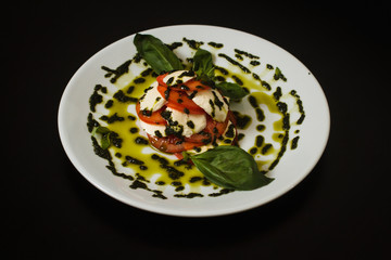 Mozzarella with pesto and basil
