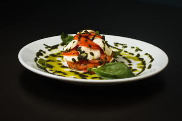 Mozzarella with pesto and basil