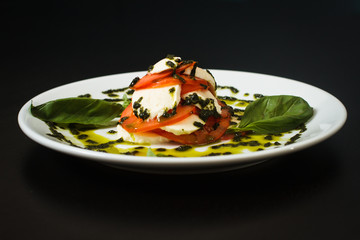 Mozzarella with pesto and basil