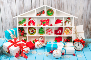 Christmas background with gingerbread, decorations and gift boxe