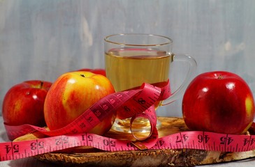 fresh apples, apple juice or apple cider vinegar in your diet - soft focus
