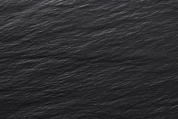 Dark black stone background or texture